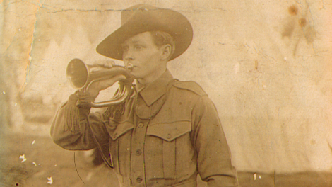 Roscoe playing his bugle at Blackboy Hill Camp. Dated 9-9-14